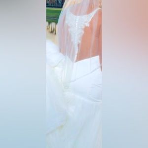 White Wedding Dress for bride. Size 10 Essence of Australia